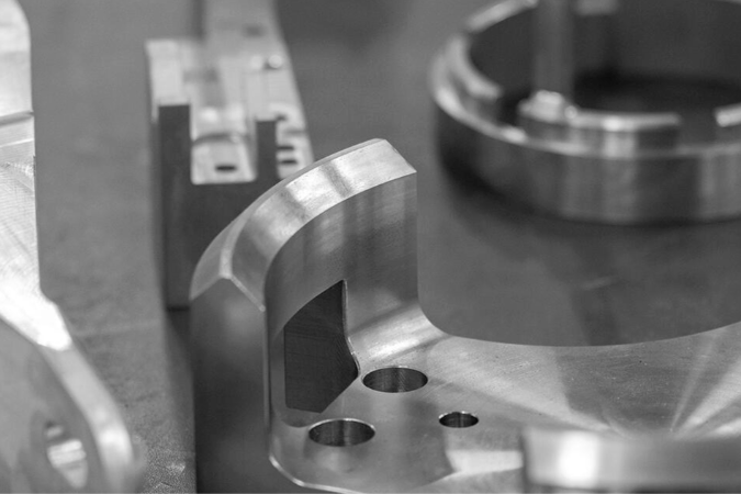 Närbild av maskindel RLM Mekaniska AB